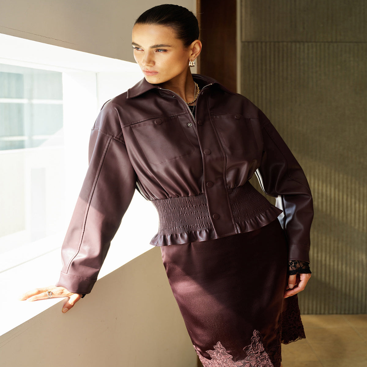 Faux Leather Crop Jacket with Elastic Waistband and Long Sleeves