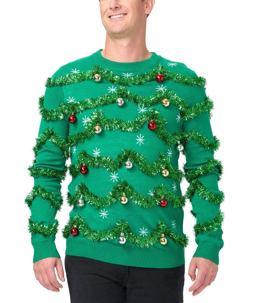 Green Christmas tree-themed sweater with decorations on a white background