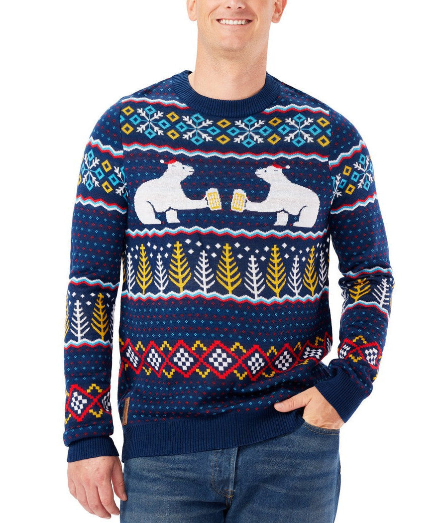 Person wearing a festive sweater with polar bear design on a white background
