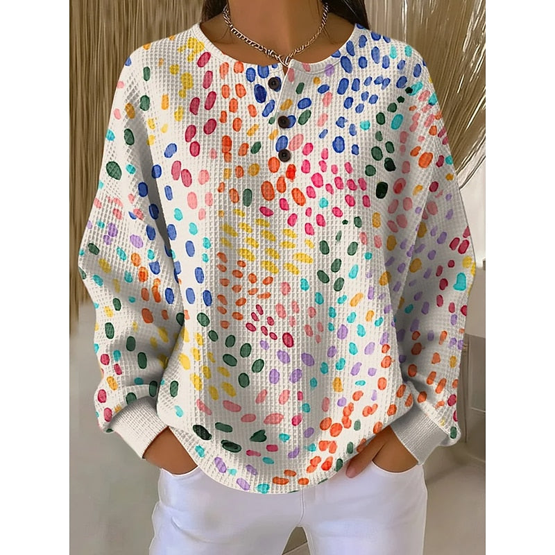 Crew Neck Pullover with Textured Knit and Artistic Print Button Placket
