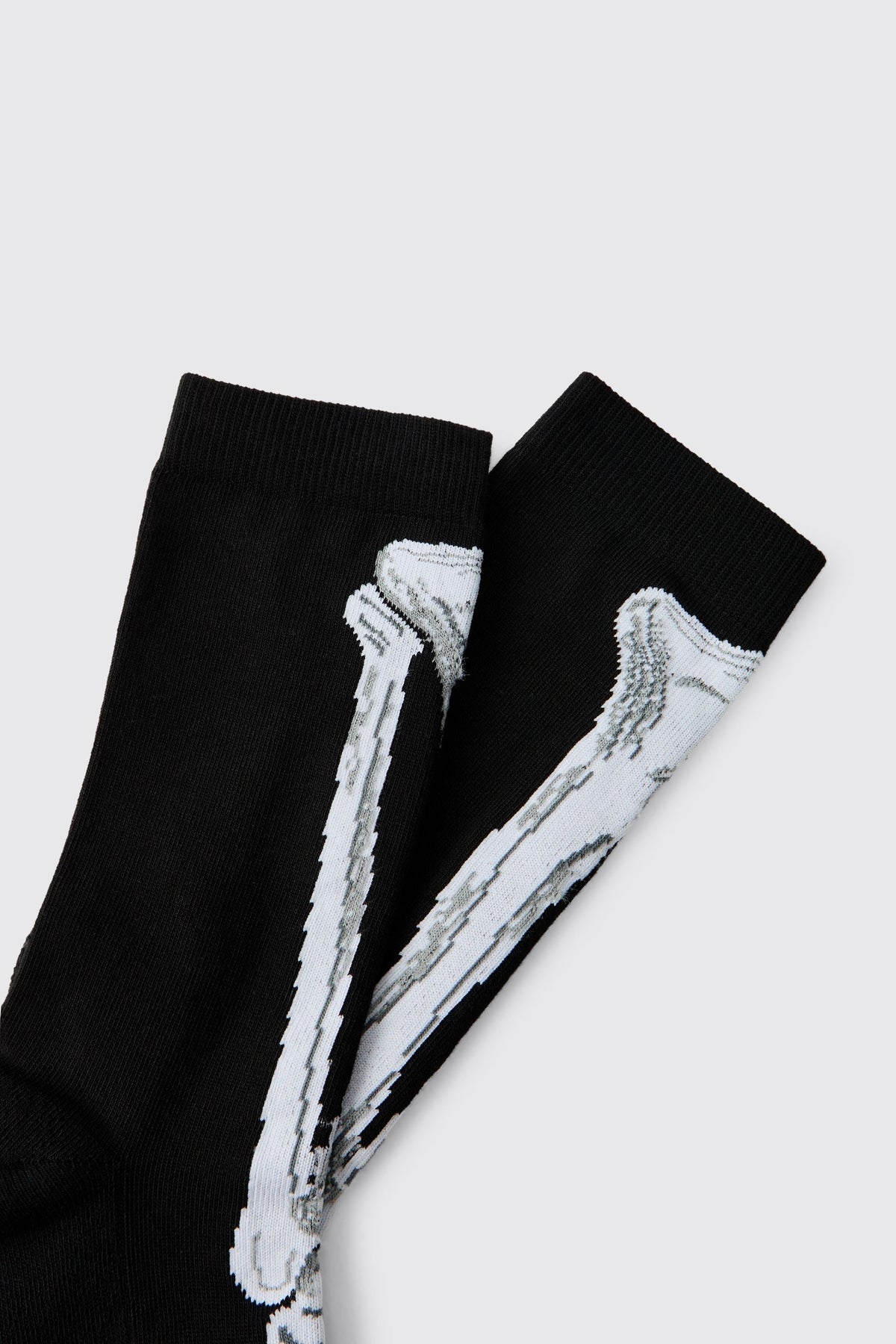 Skeleton Crew Socks with Knitted Bone Graphics and Ribbed Cuff