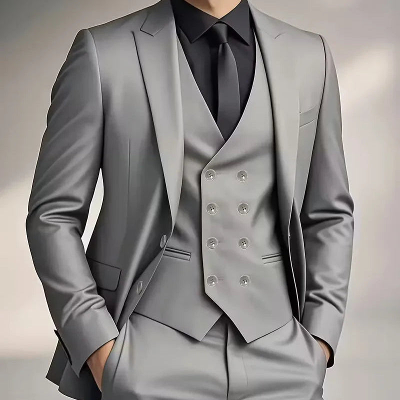 Men's slim fit double-breasted 3-piece suit, showcasing the waistcoat and jacket. Business-ready.