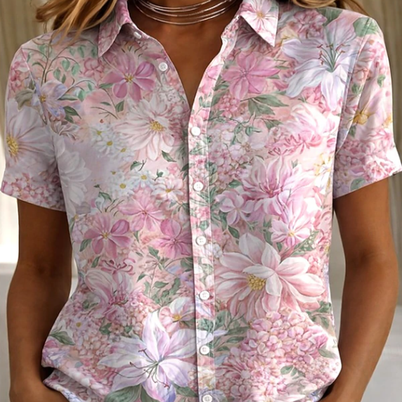 Women's casual floral button-up shirt. Lightweight short sleeve blouse, perfect for summer fashion and everyday comfort.