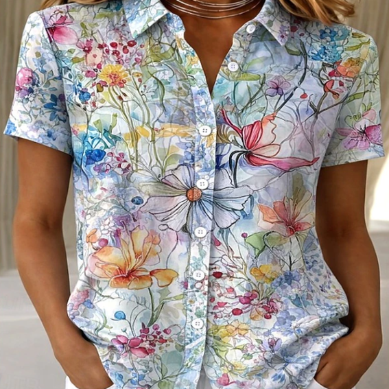 Relaxed fit women's floral button-up shirt. Stylish short sleeve blouse for casual summer and spring outfits.