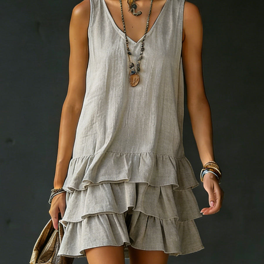Relaxed fit women's ruffle mini dress, ideal for casual weekend wear. Versatile tiered summer dress.