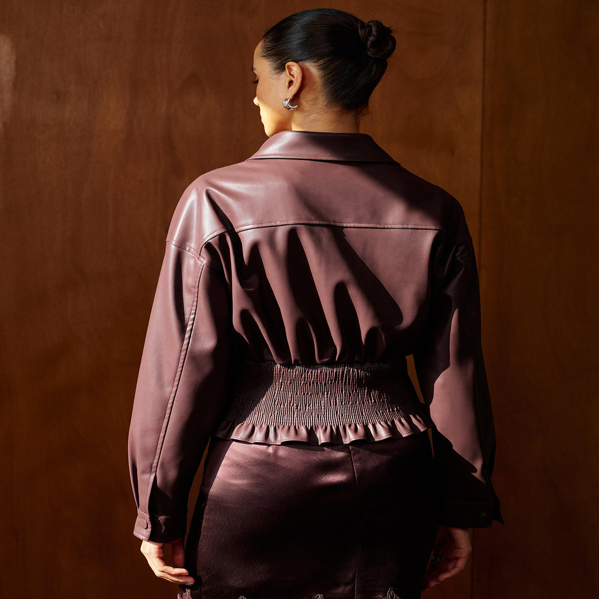 Faux Leather Crop Jacket with Elastic Waistband and Long Sleeves