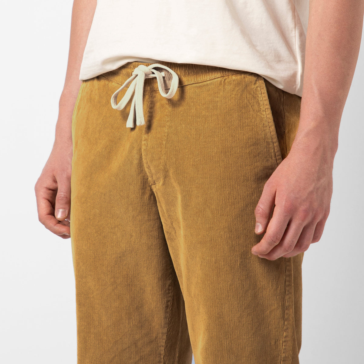 Corduroy Easy Pant British Khaki close up on model