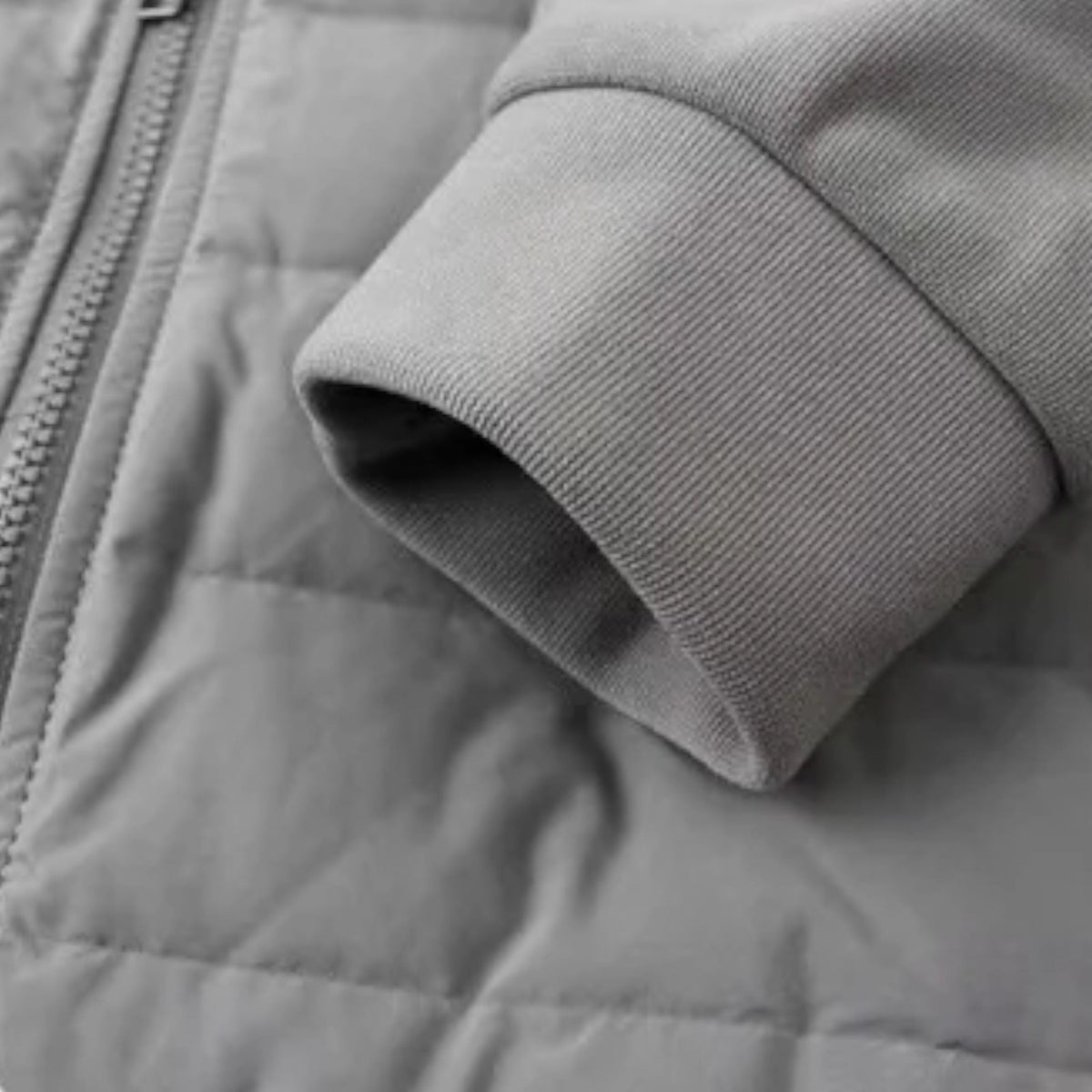 Quilted Hooded Jacket for Men with Knit Sleeves and Zipped Pockets