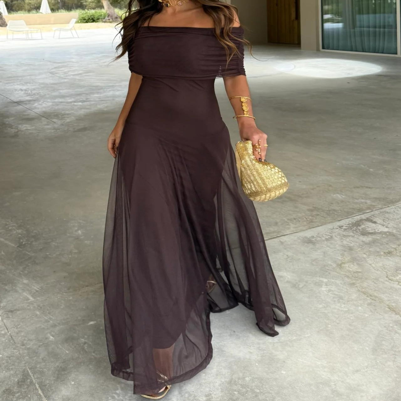 Romantic flowy brown off-shoulder maxi dress, ideal for summer garden parties & elegant outdoor events.
