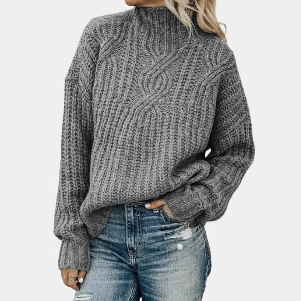 Women's Pullover Knit Sweater with Ribbed Cuffs and Hip Length Coverage