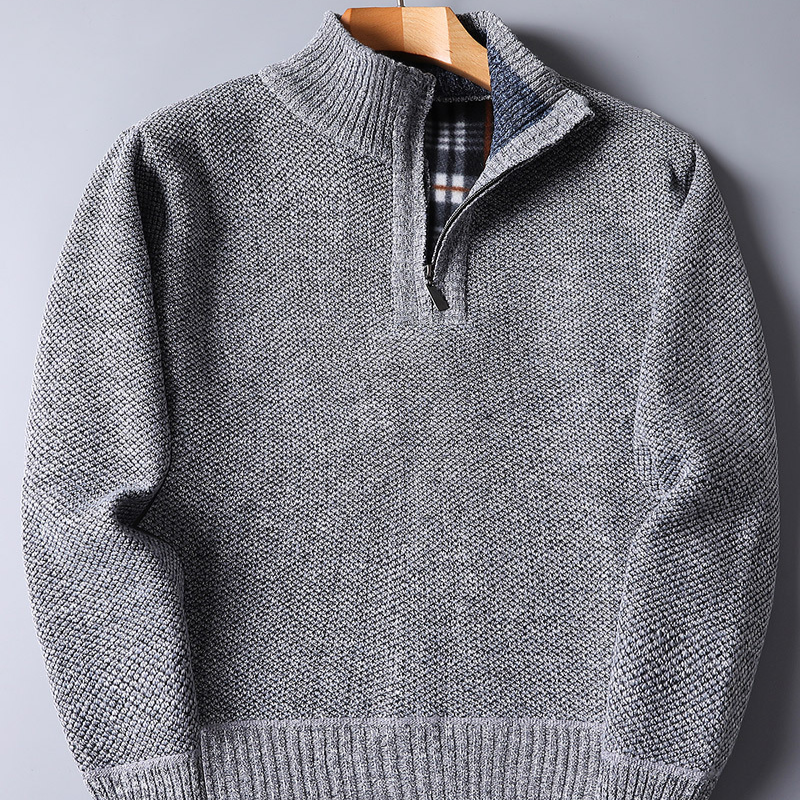 Men's blue ribbed quarter zip sweater, a versatile piece of men's clothing for various occasions.