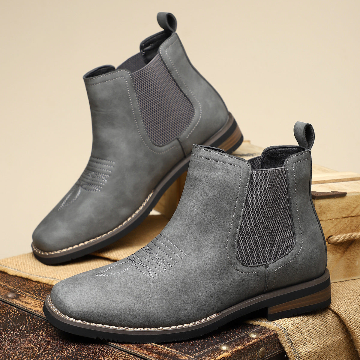Sleek men's square toe Chelsea boots with elastic side panels for effortless wear.