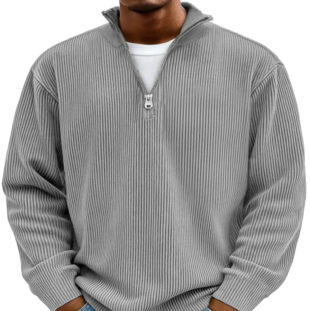 Stylish men's half-zip pullover sweater with a ribbed texture, perfect for comfortable everyday fashion.