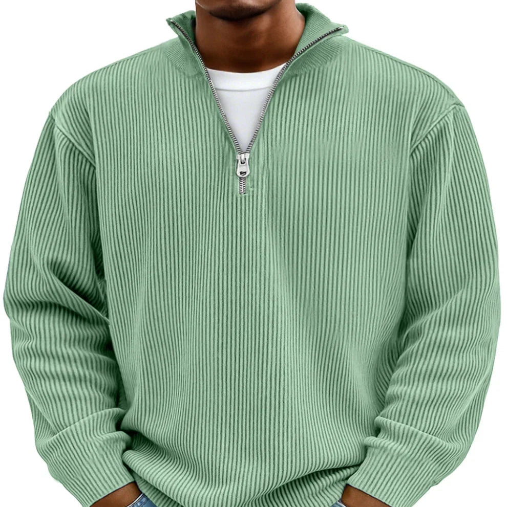 Close-up of a men's half-zip ribbed sweater, highlighting the quality knit and casual fit.