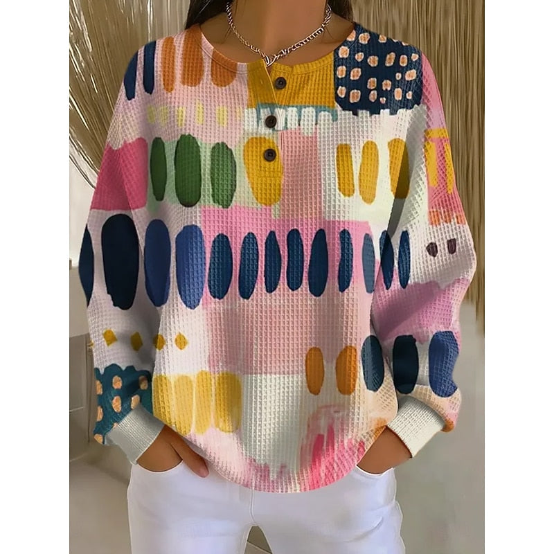 Crew Neck Pullover with Textured Knit and Artistic Print Button Placket