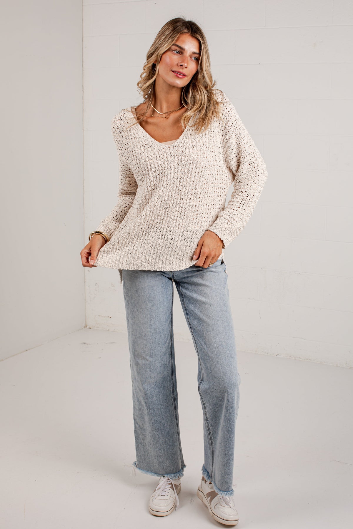 Ivory Chunky Knit Sweater with Ribbed Cuffs and Split Hem