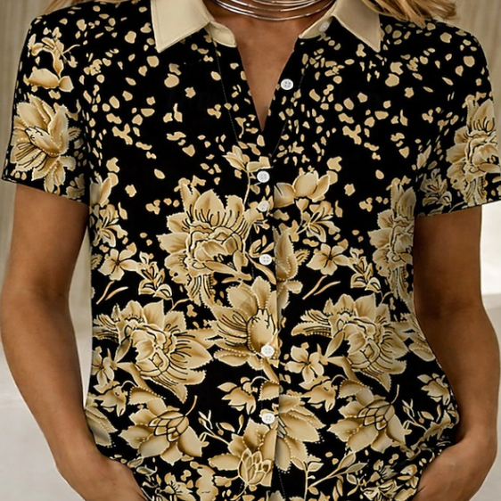 Lightweight women's floral button-up shirt. Chic short sleeve blouse, a casual and comfy summer fashion choice.