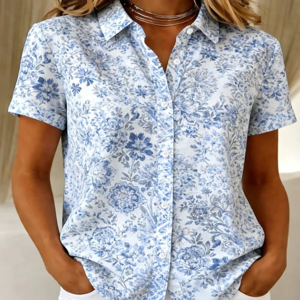 Stylish women's floral short sleeve blouse. Casual button-up shirt for comfortable summer fashion and everyday wear.