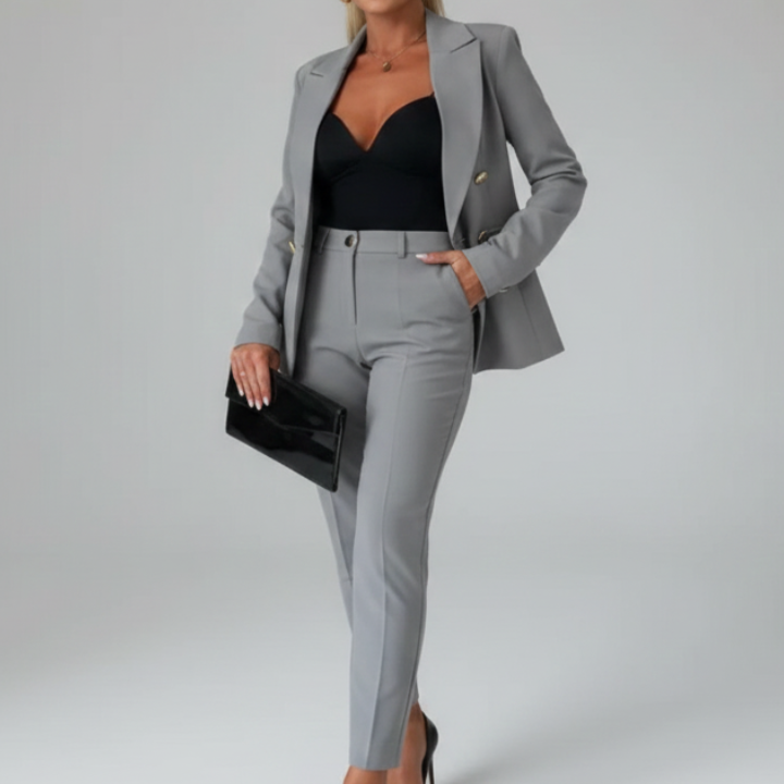 Elegant women's double-breasted two-piece suit. Effortless style for office, business & formal.